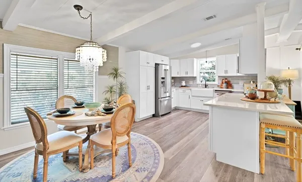 a view of a dining room and livingroom view