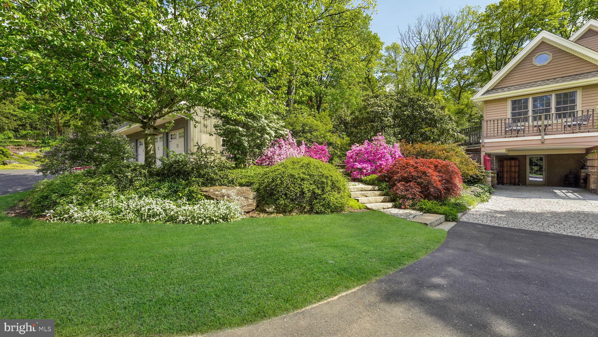 46 Valley Road New Hope, PA 18938 - Photo 3 of 56 a front view of a house with a yard and a garage
