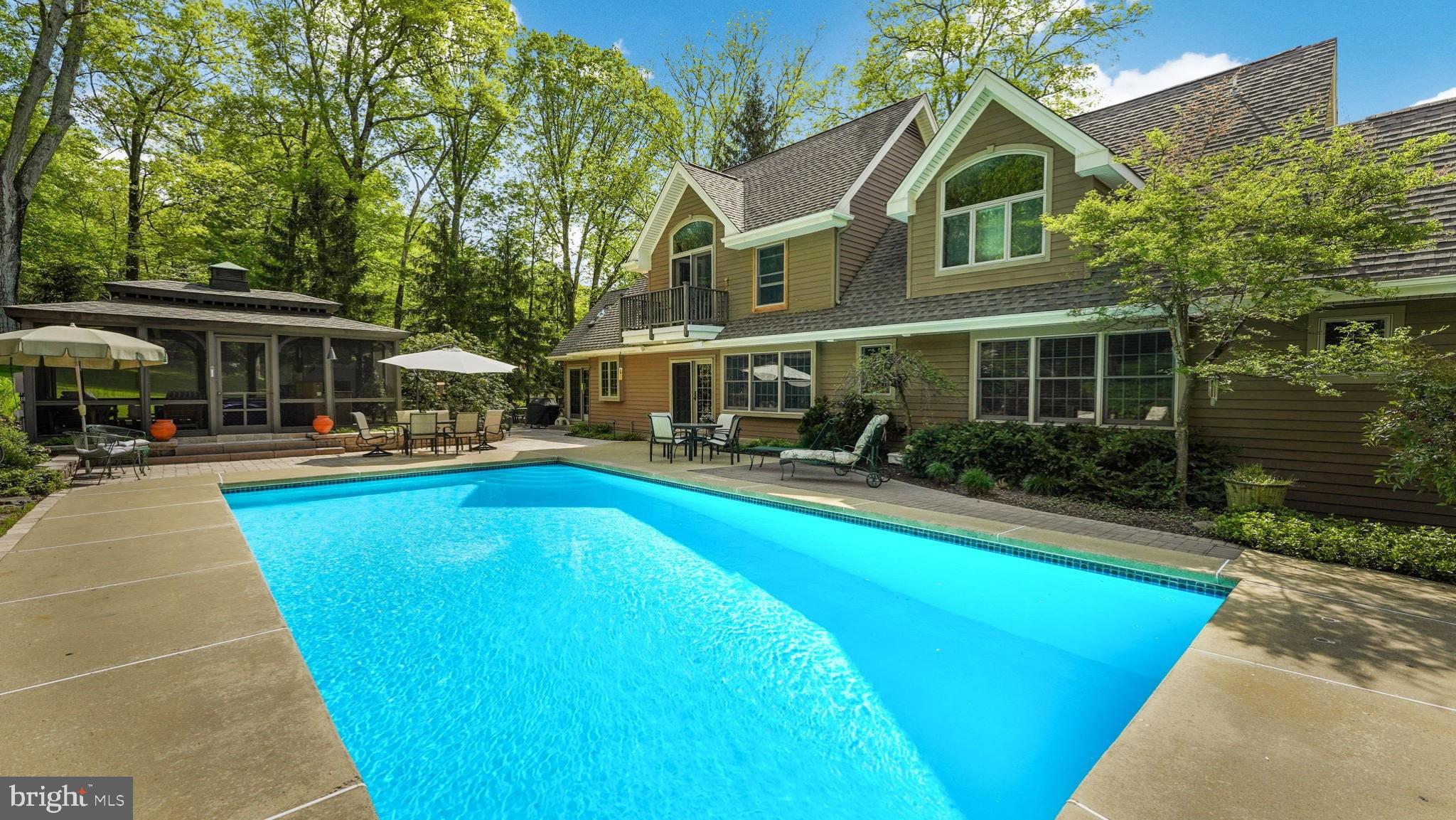 46 Valley Road New Hope, PA 18938 - Photo 37 of 56 a swimming pool view with a seating space and a garden view