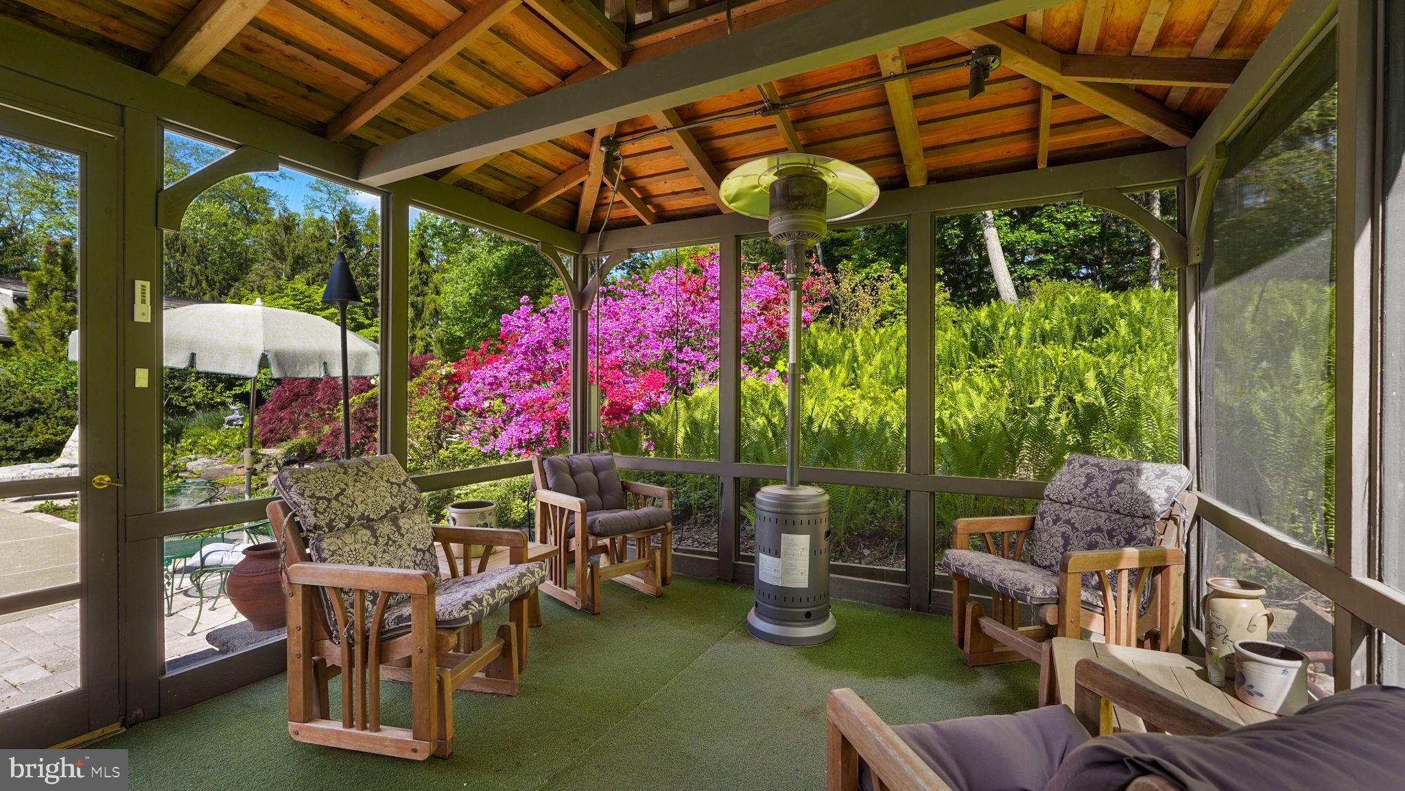 46 Valley Road New Hope, PA 18938 - Photo 39 of 56 a patio with a patio table and chairs with a barbeque grill