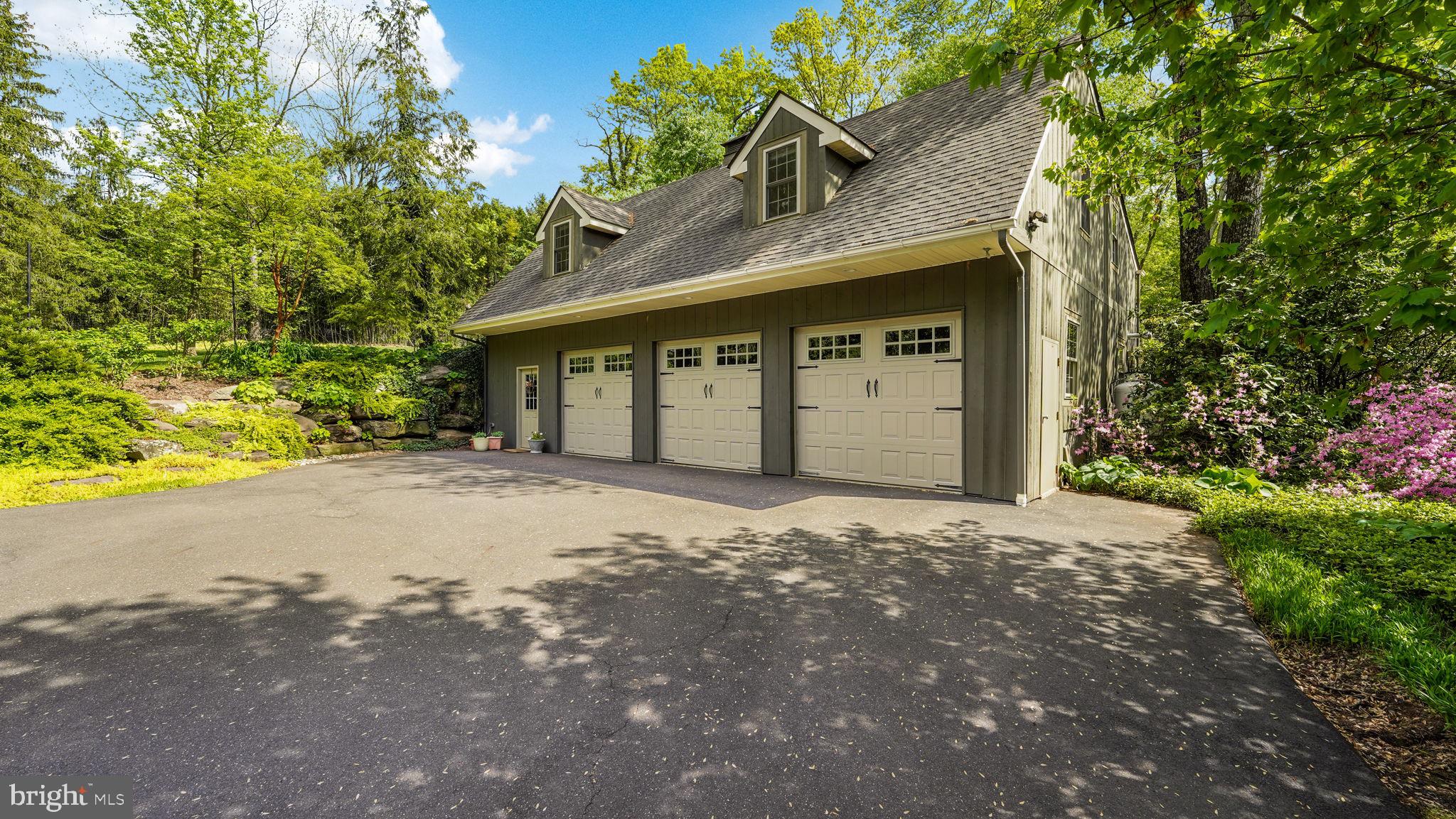 46 Valley Road New Hope, PA 18938 - Photo 4 of 56 a view of a house with a yard and garage