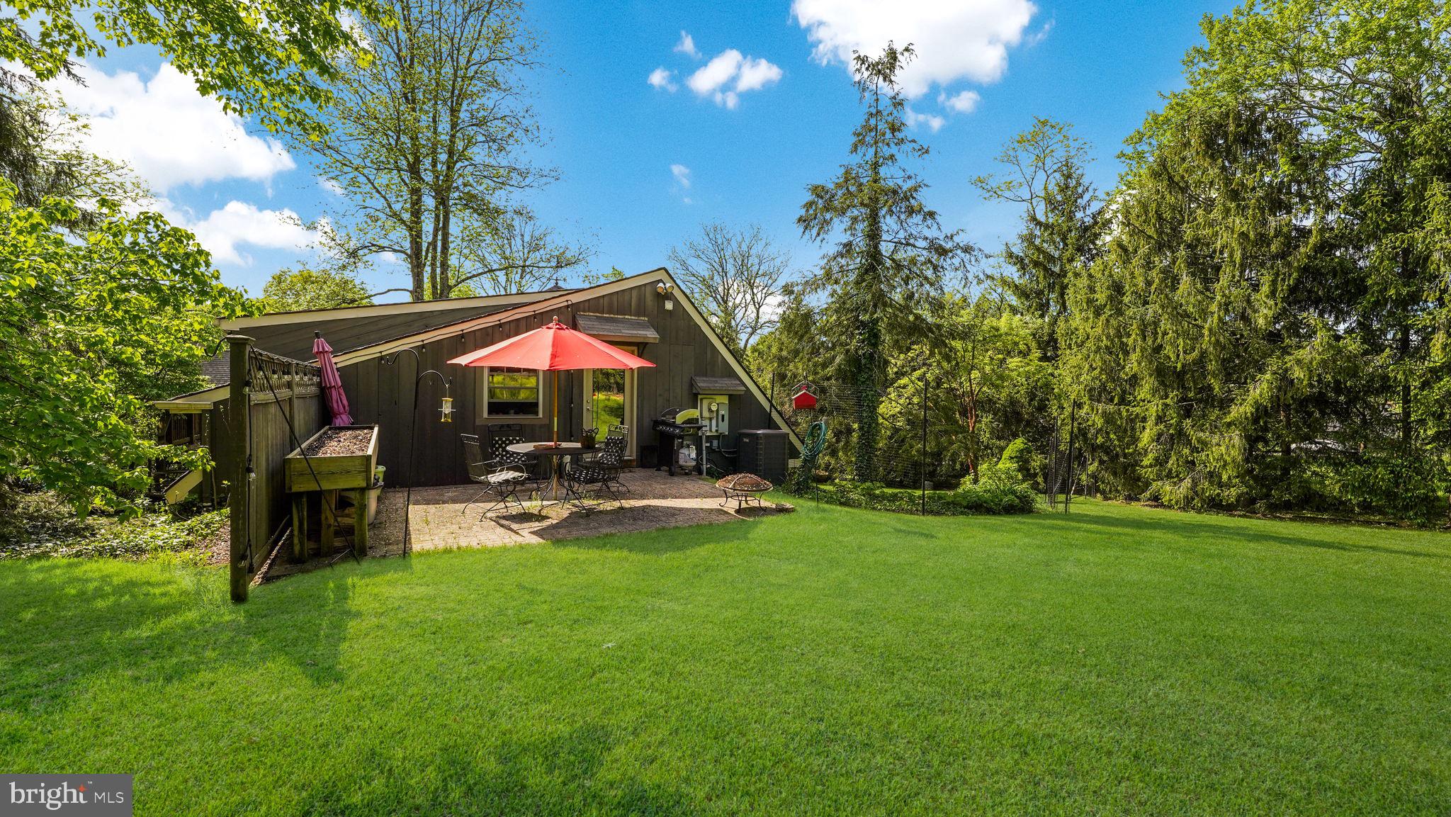 46 Valley Road New Hope, PA 18938 - Photo 44 of 56 a view of a house with backyard and sitting area