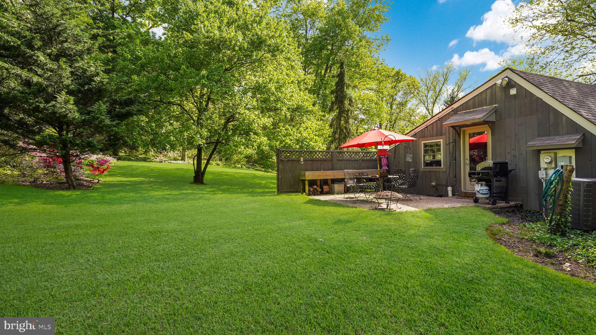 46 Valley Road New Hope, PA 18938 - Photo 45 of 56 a view of a house with backyard and sitting area