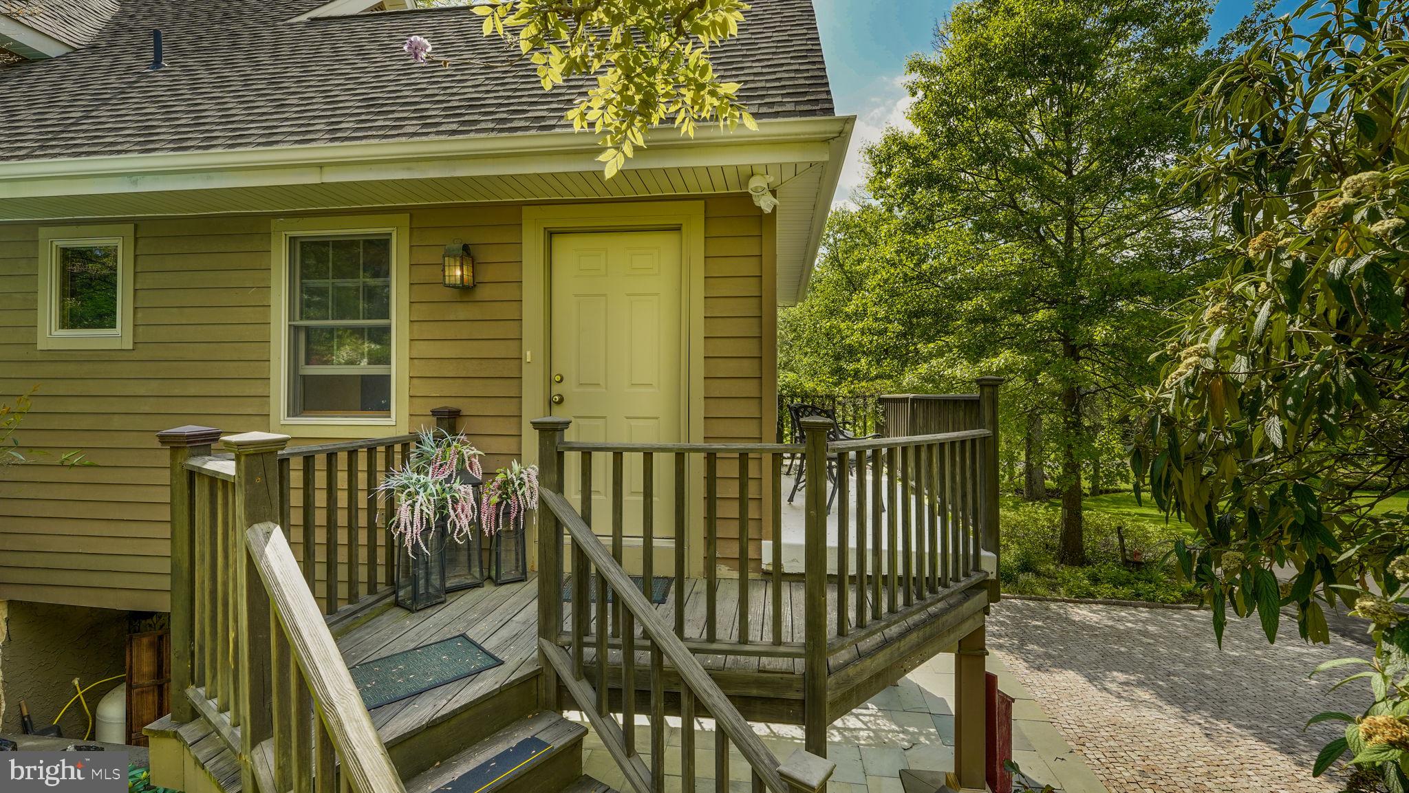 46 Valley Road New Hope, PA 18938 - Photo 46 of 56 a view of a wooden bench with a bench