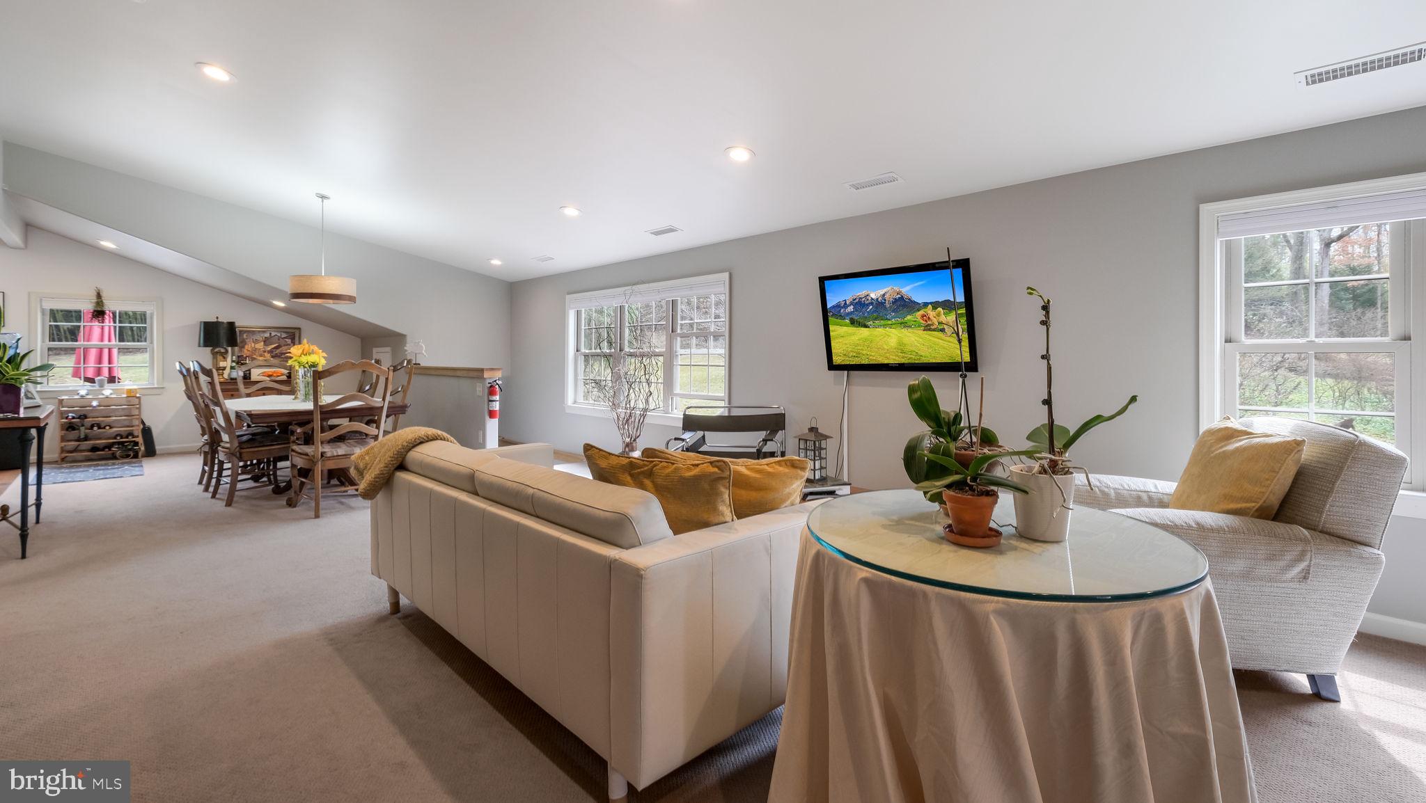 46 Valley Road New Hope, PA 18938 - Photo 47 of 56 a living room with furniture and floor to ceiling window