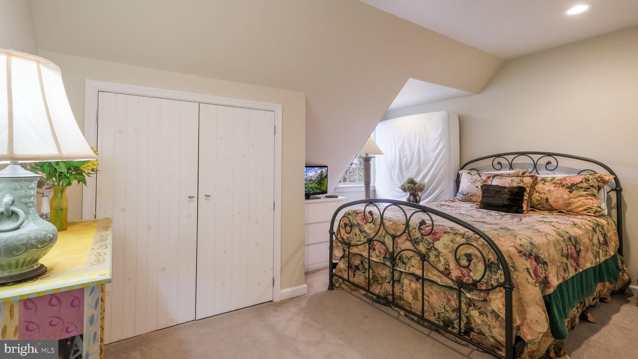 46 Valley Road New Hope, PA 18938 - Photo 53 of 56 a bedroom with a bed and a window