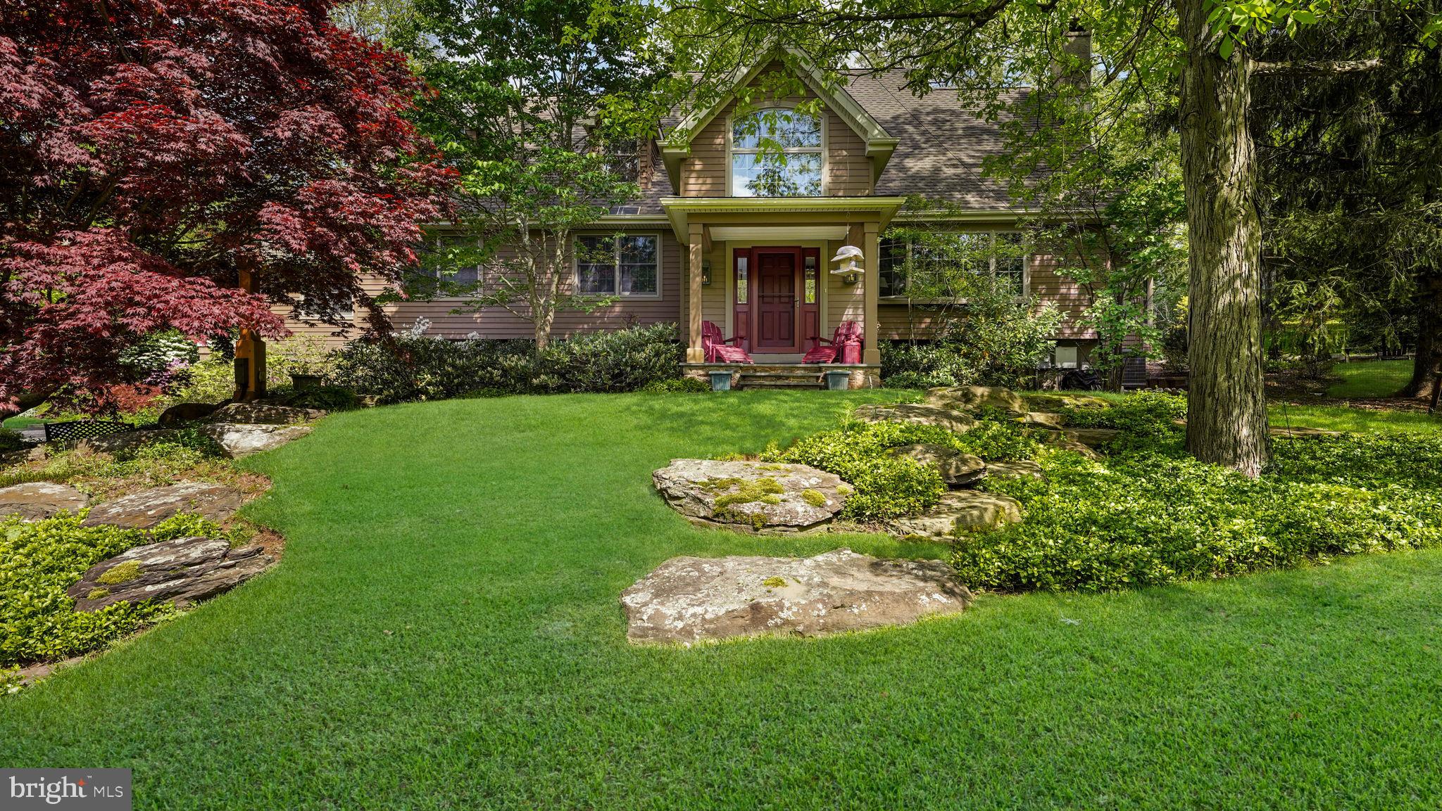 46 Valley Road New Hope, PA 18938 - Photo 56 of 56 a front view of a house with a yard table and chairs