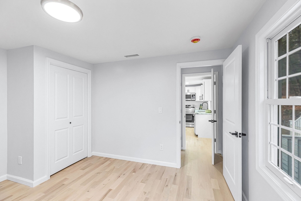 143 James Street Ludlow, MA 01056 - Photo 20 of 41 a view of a room with wooden floor and windows