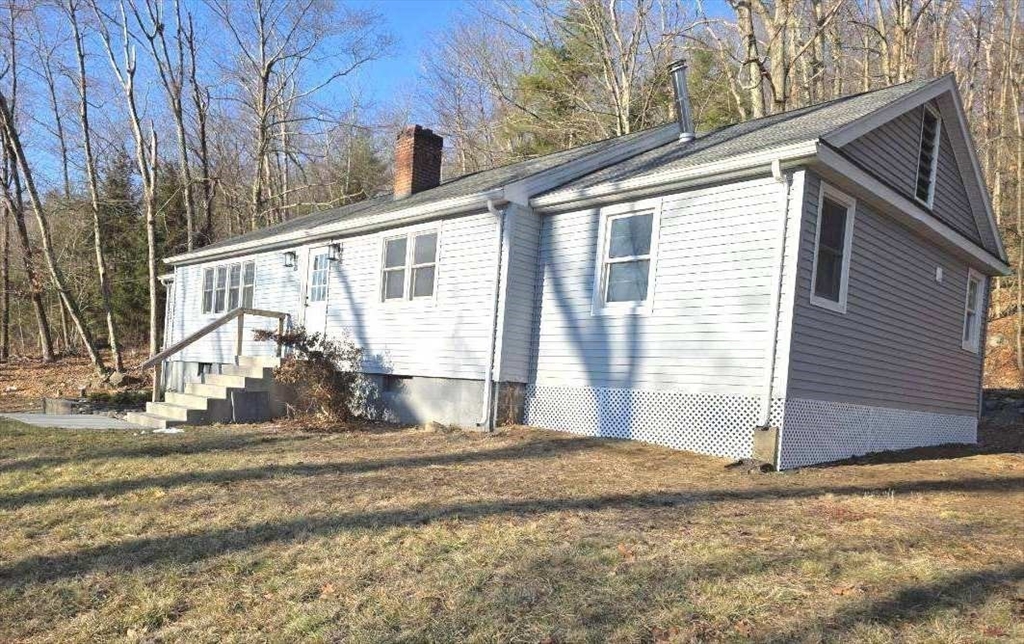 143 James Street Ludlow, MA 01056 - Photo 2 of 41 a view of a house with a yard