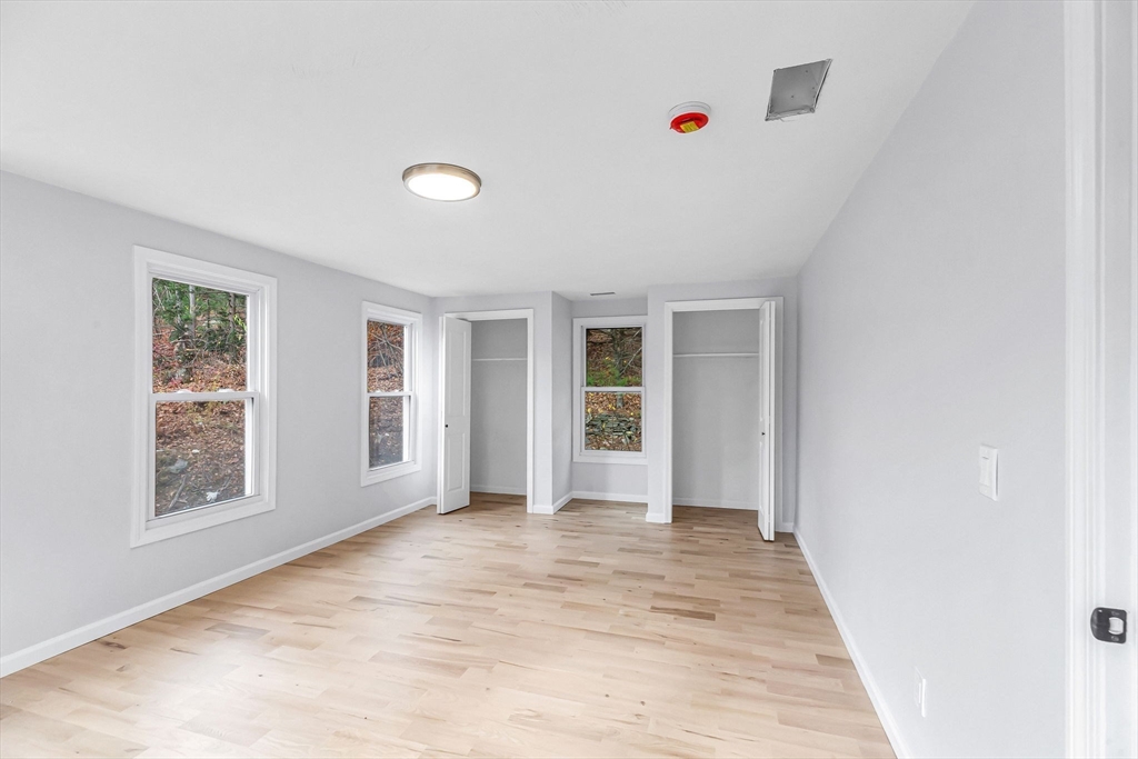 143 James Street Ludlow, MA 01056 - Photo 22 of 41 an empty room with windows and closet