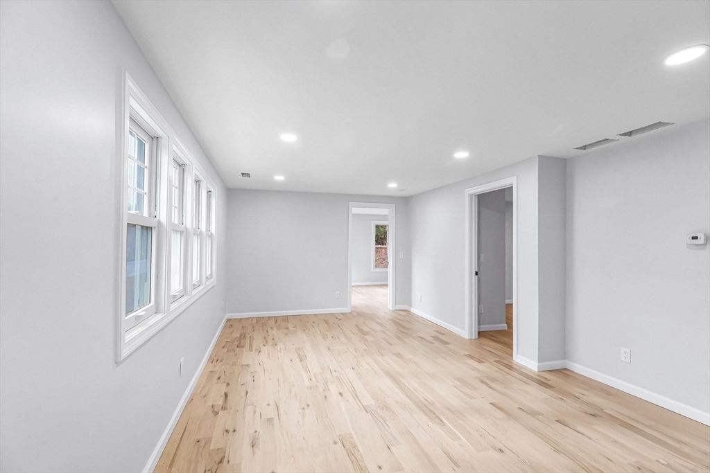 143 James Street Ludlow, MA 01056 - Photo 7 of 41 a view of empty room with wooden floor and fan