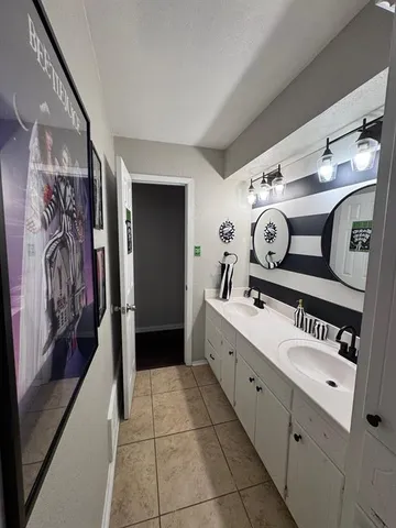 a utility room with washer and dryer
