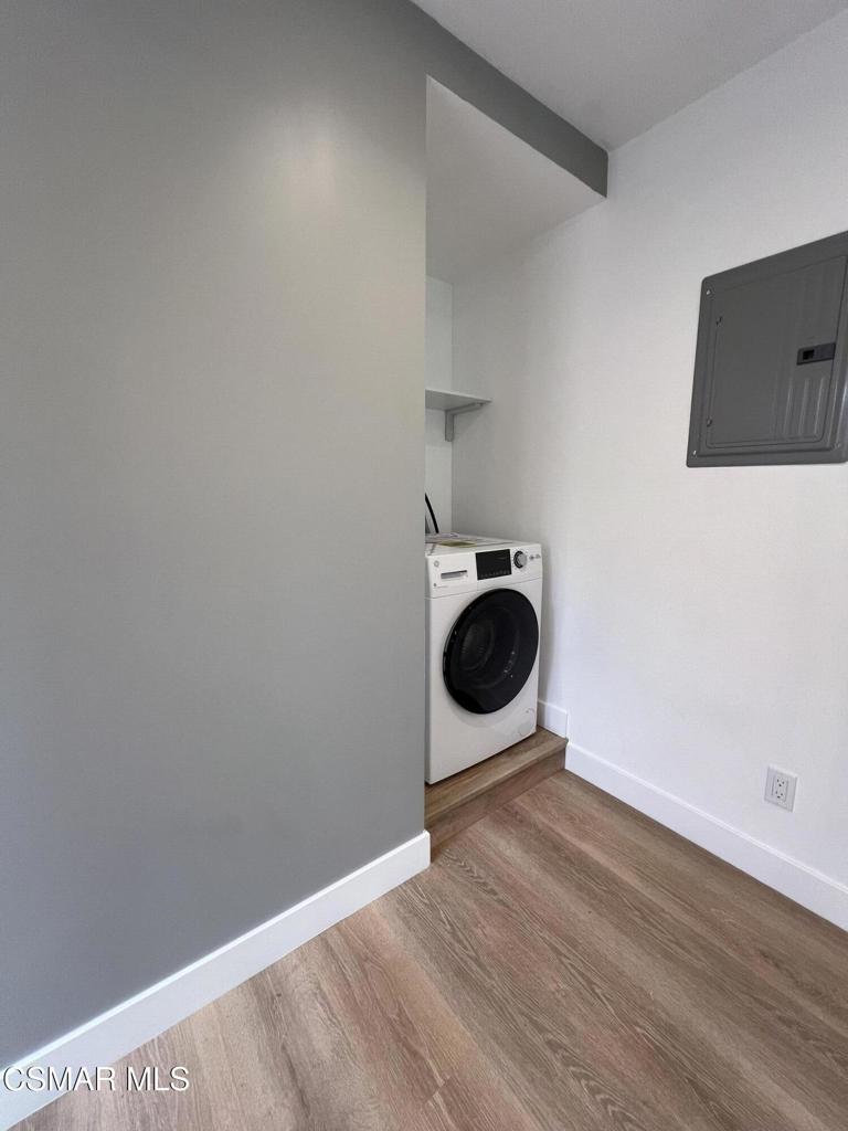 1666 1/2 Stoddard Avenue Thousand Oaks, CA 91360 - Photo 14 of 17 a view of a storage and utility room with a washer and dryer