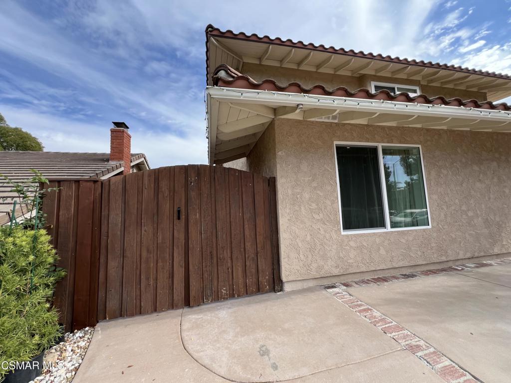 1666 1/2 Stoddard Avenue Thousand Oaks, CA 91360 - Photo 15 of 17 a view of a house with a garage