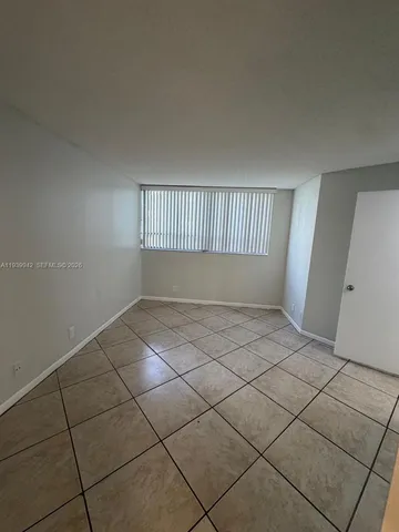 a kitchen with a stove and a sink