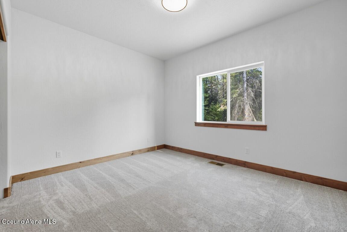 12664 East Howard Road Athol, ID 83801 - Photo 22 of 40 Bedroom 3