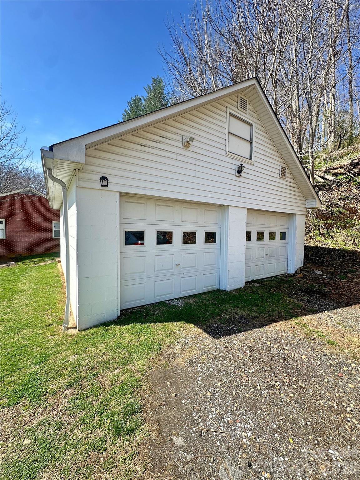 882 Poison Cove Road Clyde, NC 28721 - Photo 22 of 22 a view of a house with a yard