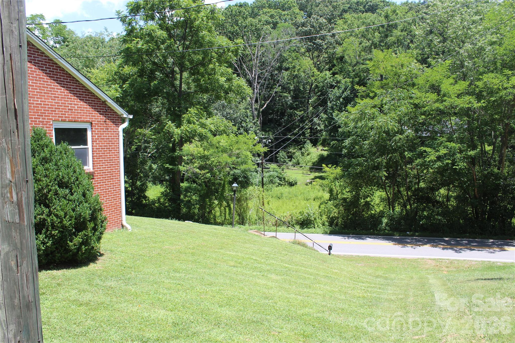 882 Poison Cove Road Clyde, NC 28721 - Photo 4 of 22 a view of a backyard