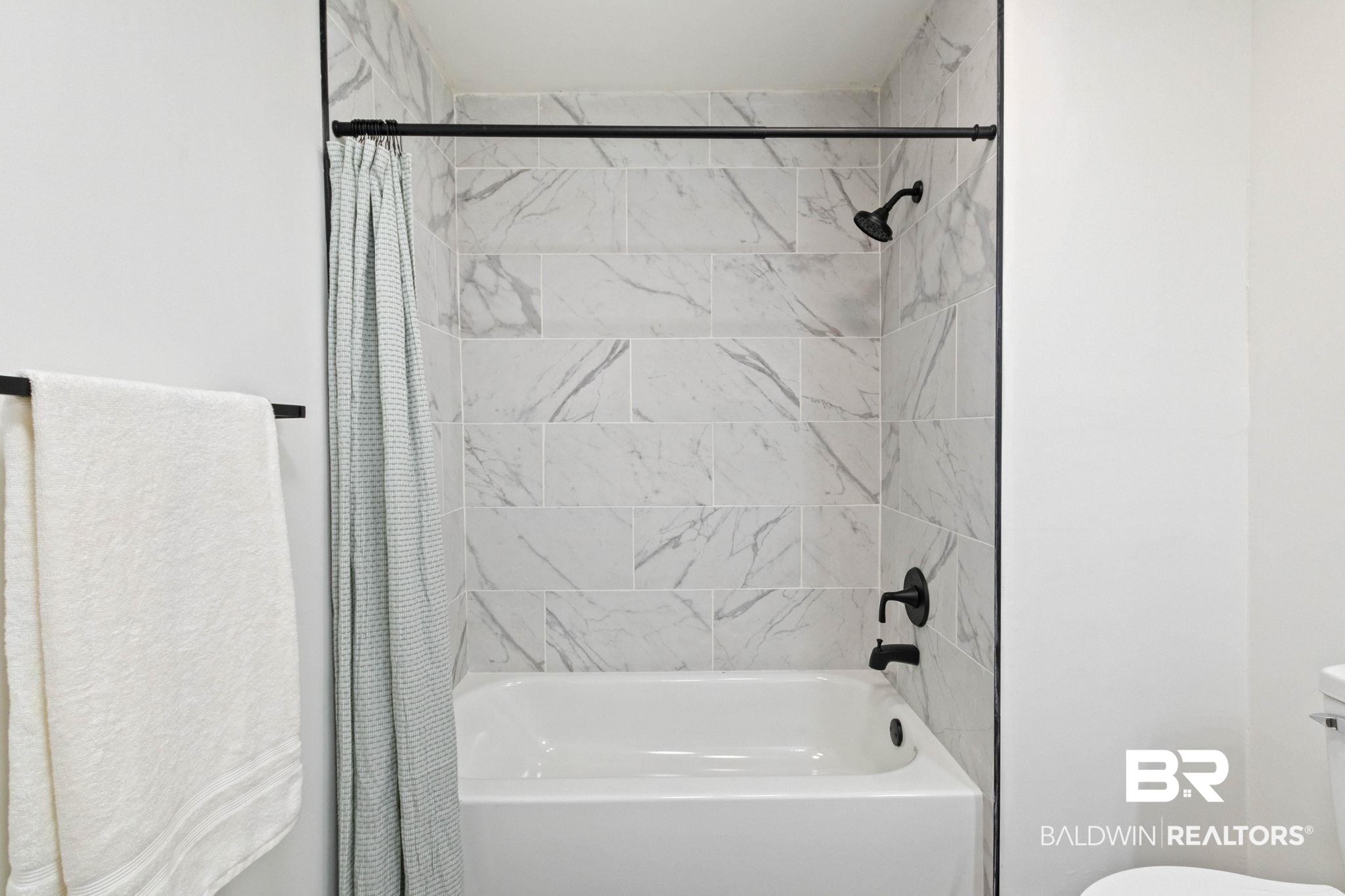 128 Bush Avenue Mobile, AL 36604 - Photo 34 of 40 Full bathroom featuring toilet and shower / bath combination with curtain