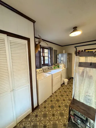 a room with a washer and dryer