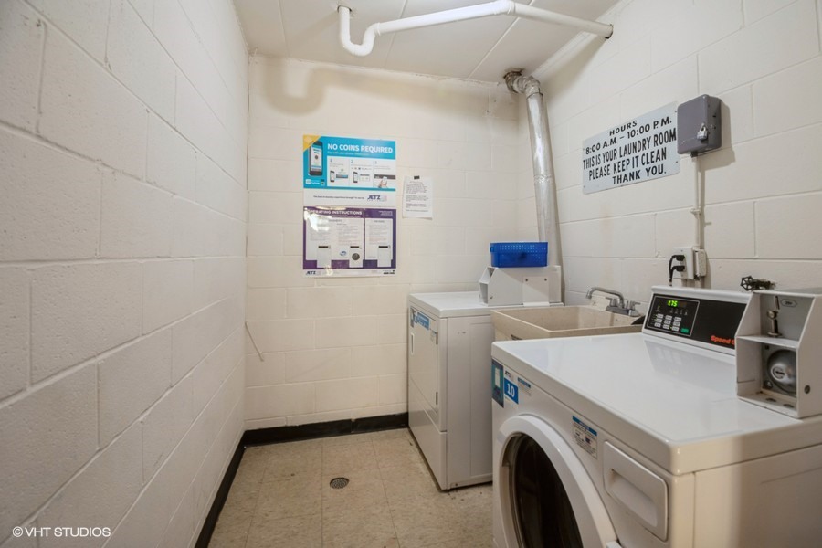 2340 186th Street, Unit 28 Lansing, IL 60438 - Photo 13 of 14 a utility room with dryer and washer