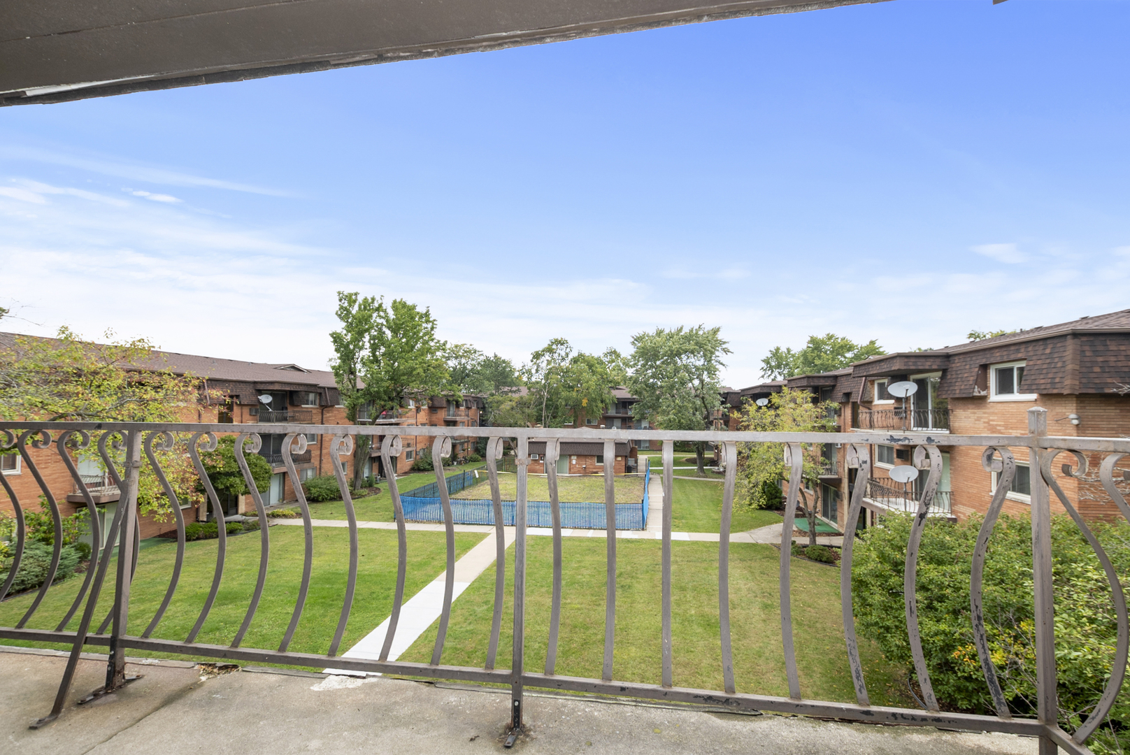 2340 186th Street, Unit 28 Lansing, IL 60438 - Photo 14 of 14 a view of a balcony with a lake view