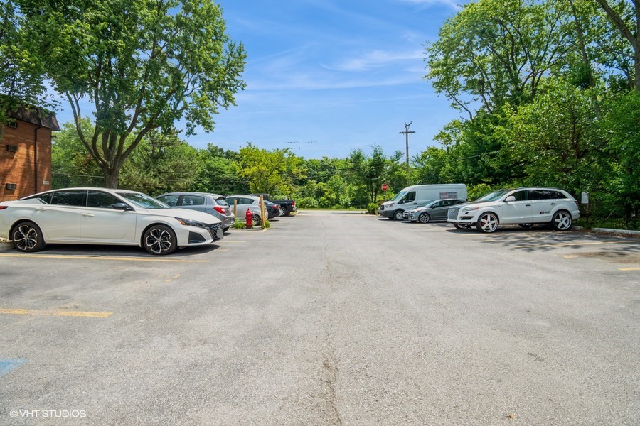 2340 186th Street, Unit 28 Lansing, IL 60438 - Photo 4 of 14 an outdoor view with cars