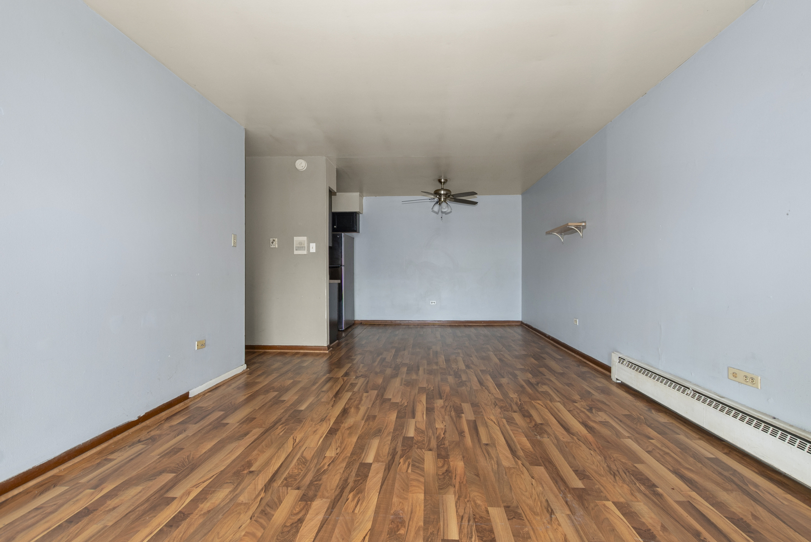 2340 186th Street, Unit 28 Lansing, IL 60438 - Photo 7 of 14 a view of empty room with wooden floor