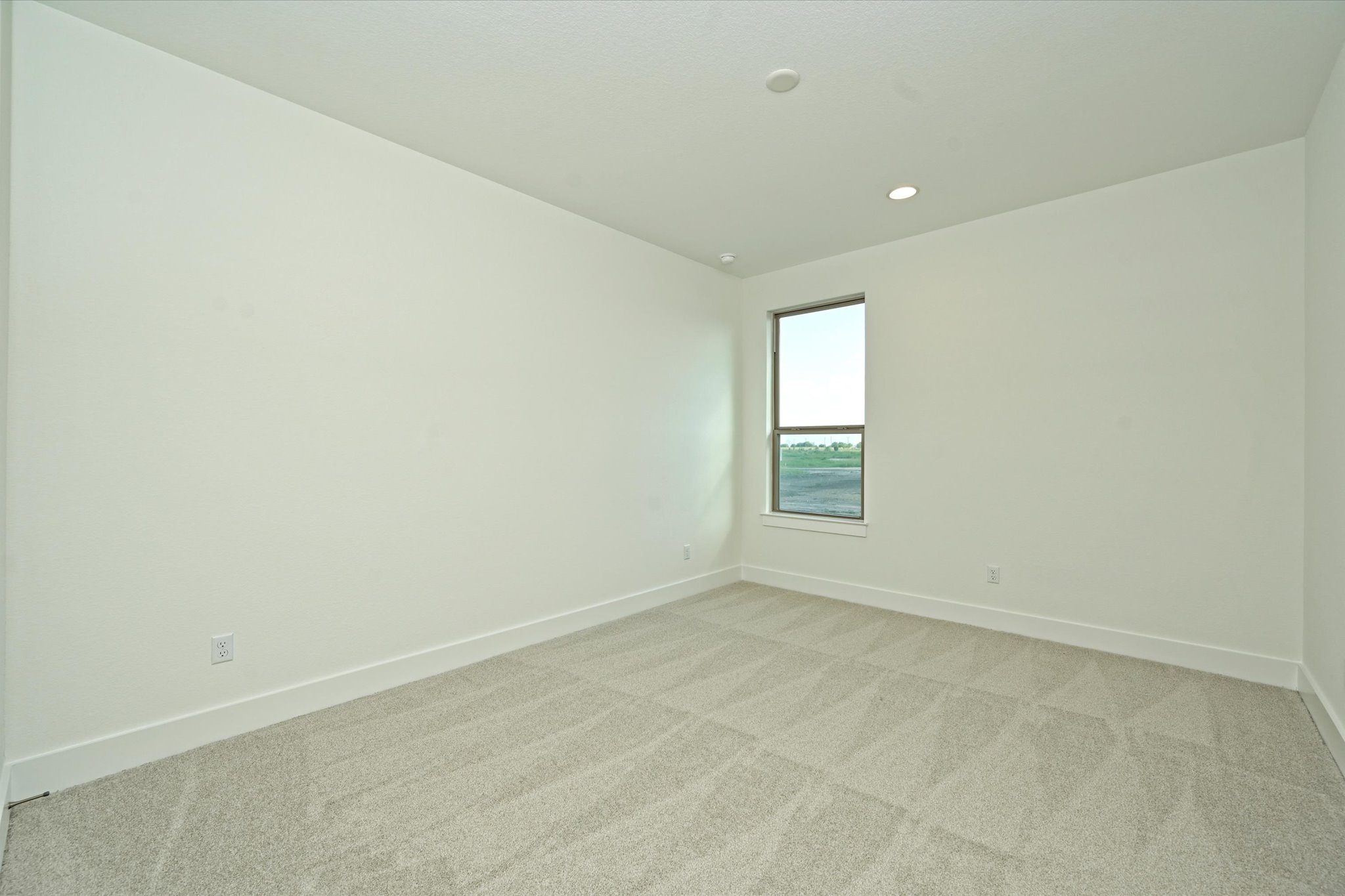 209 Scofield Avenue Georgetown, TX 78626 - Photo 23 of 33 an empty room with a window