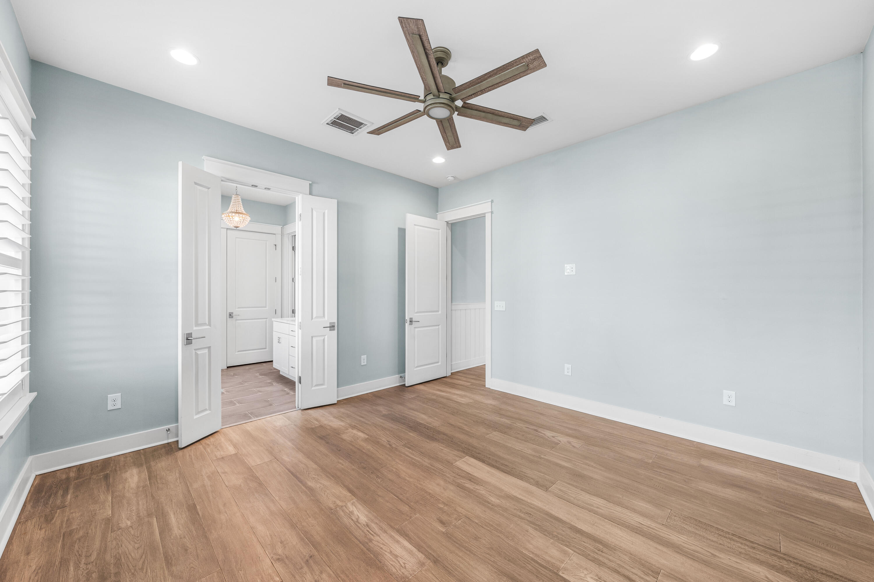 234 Sidecamp Rd Inlet Beach Inlet Beach, FL 32461 - Photo 29 of 57 an empty room with wooden floor and windows
