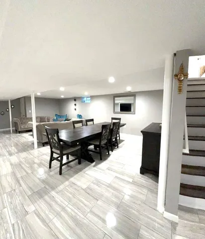 a view of a dining room with furniture