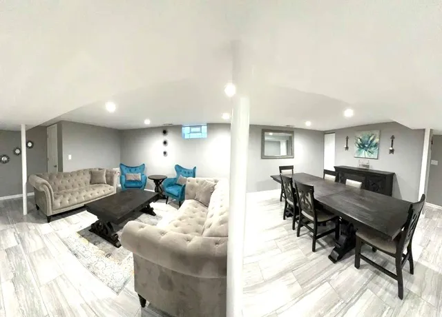 a living room with furniture and a table