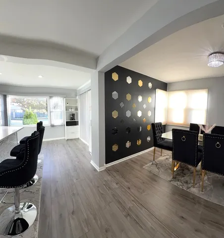 a view of a living room and dining room