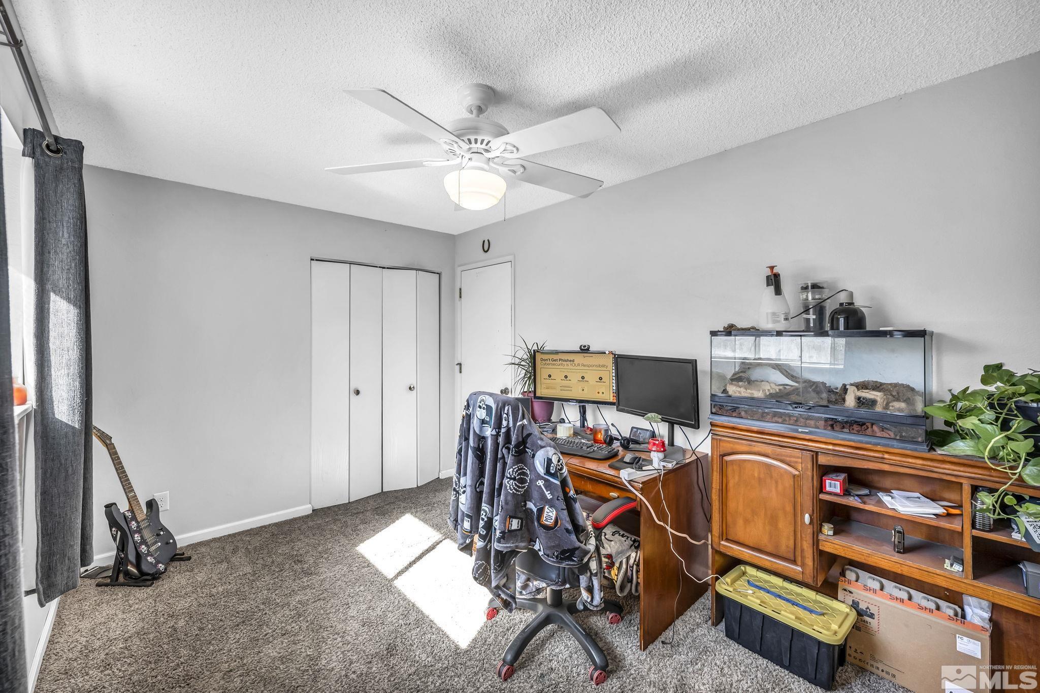 1011 Bonnie Lane Fallon, NV 89406 - Photo 20 of 31 a view of a workspace with furniture