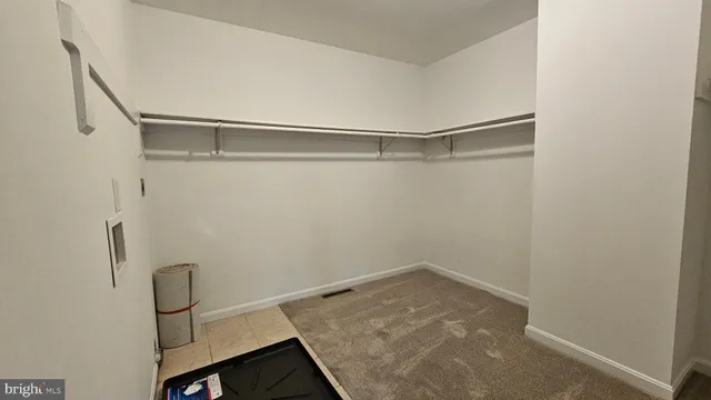 a view of a room with racks on the wall