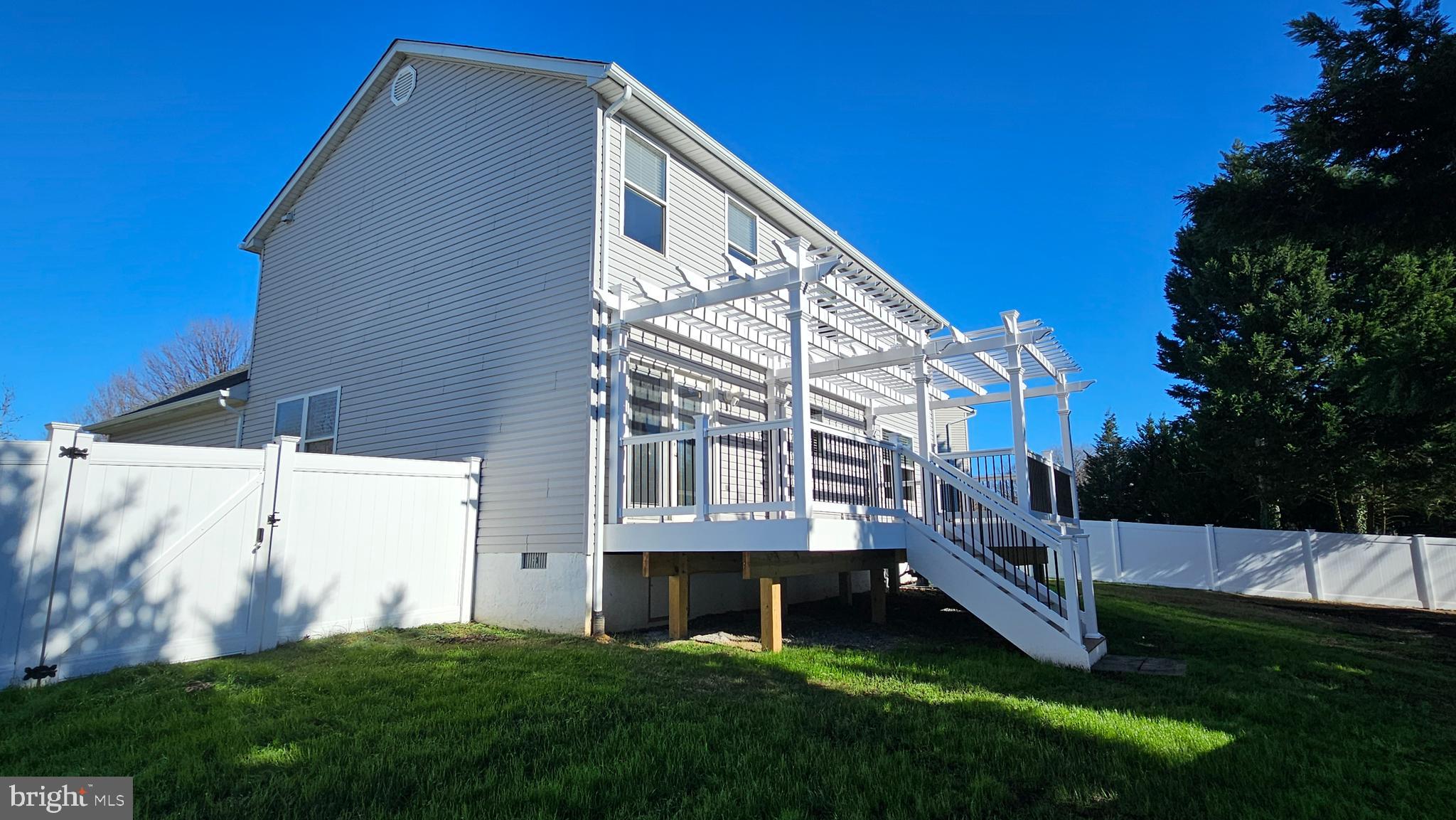 45655 Centerview Lane Great Mills, MD 20634 - Photo 30 of 38 a view of backyard with barbeque grill and stairs