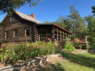 634 Old Plank Road Coxsackie, NY 12042 - Photo 1 of 49 front view of a house with a yard
