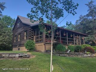 634 Old Plank Road Coxsackie, NY 12042 - Photo 2 of 49 a view of a house with a yard and plants
