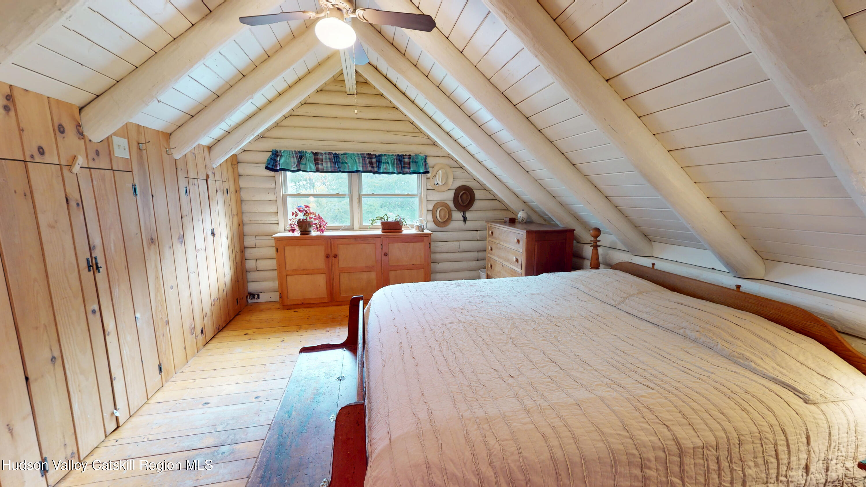 634 Old Plank Road Coxsackie, NY 12042 - Photo 28 of 49 a bedroom with a bed and large windows