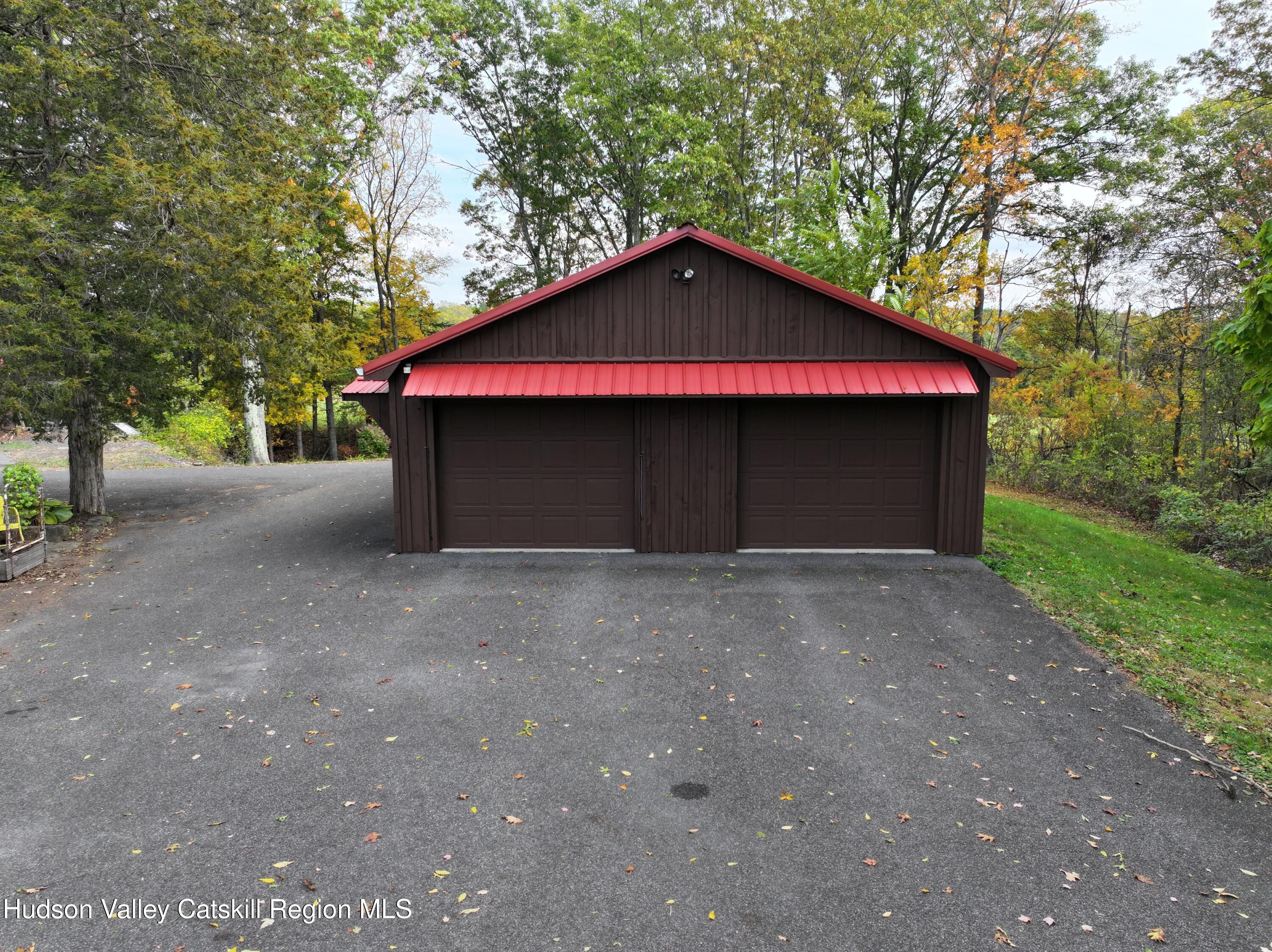634 Old Plank Road Coxsackie, NY 12042 - Photo 39 of 49 a house with trees in the background