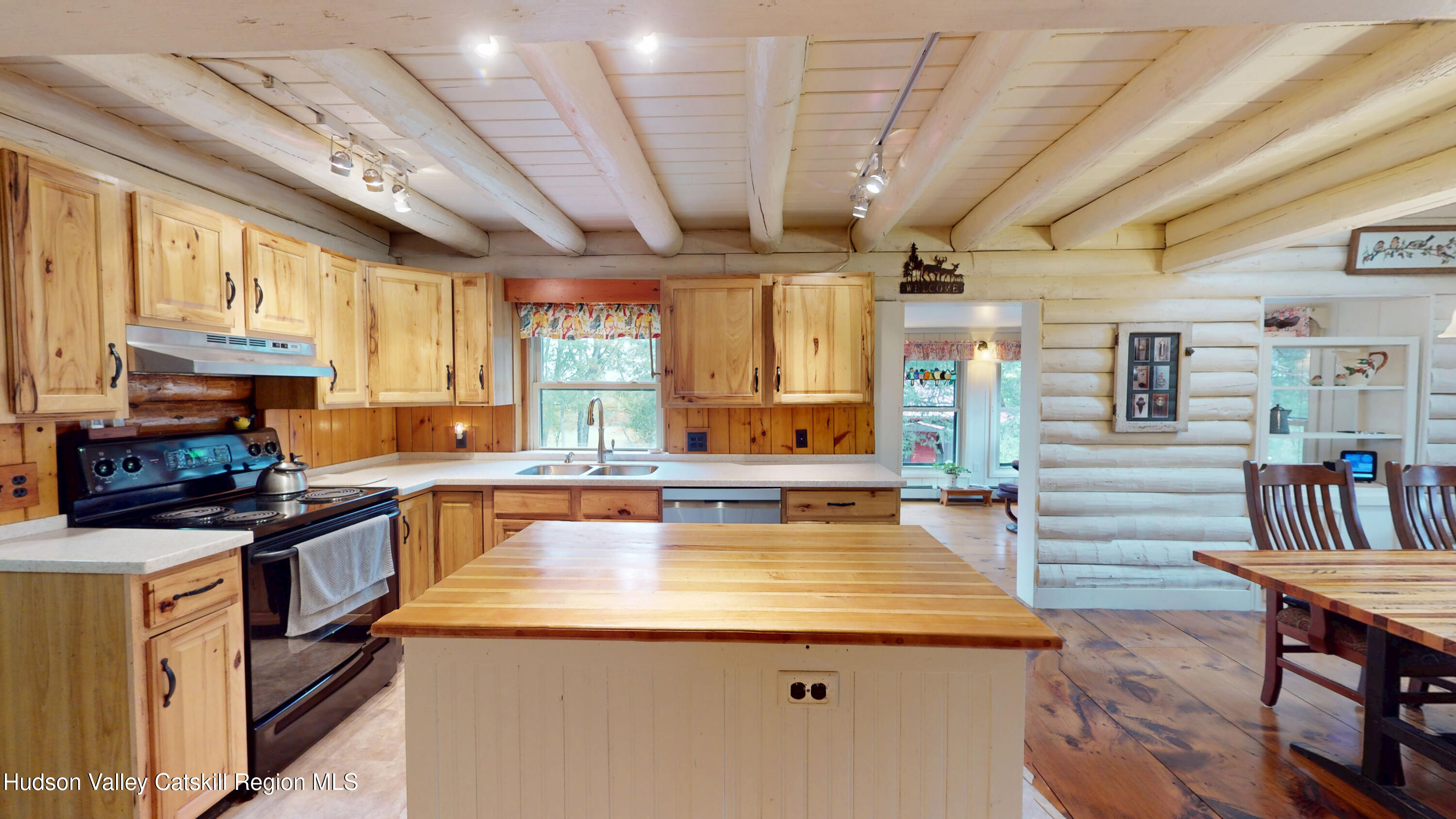 634 Old Plank Road Coxsackie, NY 12042 - Photo 9 of 49 a kitchen with kitchen island granite countertop lots of counter top space and stainless steel appliances