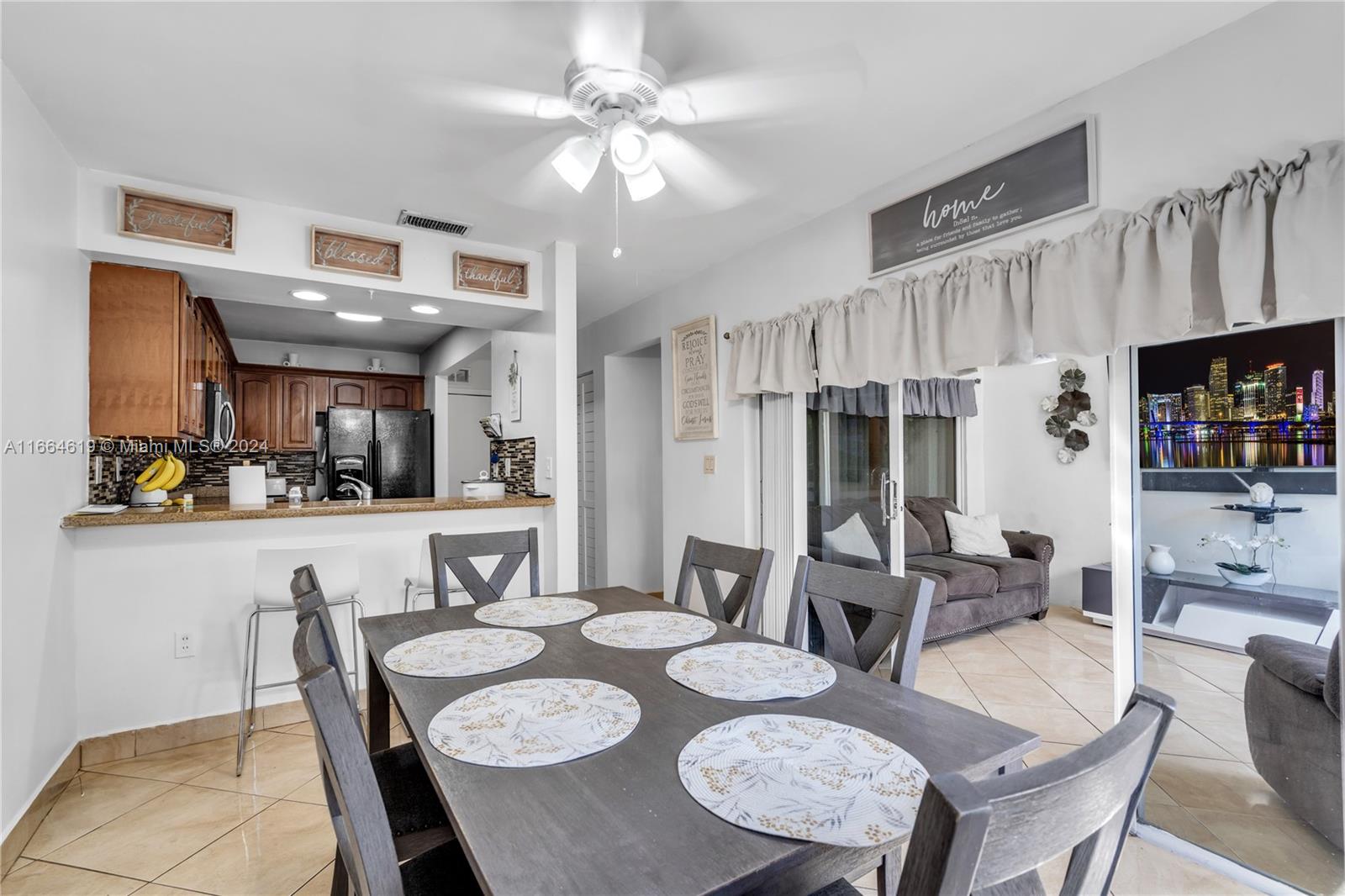 15831 Southwest 143rd Court Miami, FL 33177 - Photo 12 of 27 a view of a dining room with furniture