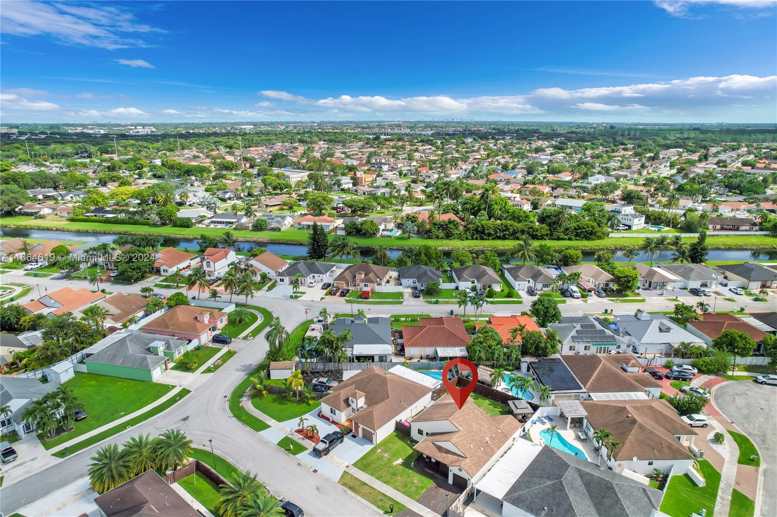 15831 Southwest 143rd Court Miami, FL 33177 - Photo 2 of 27 an aerial view of residential houses with outdoor space