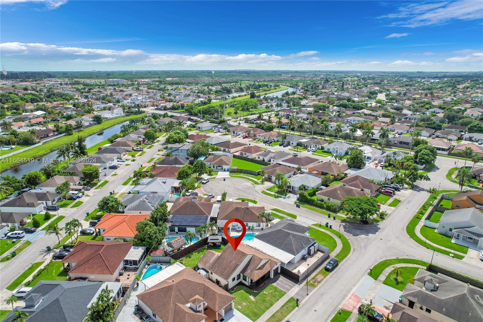 15831 Southwest 143rd Court Miami, FL 33177 - Photo 4 of 27 an aerial view of residential houses with outdoor space