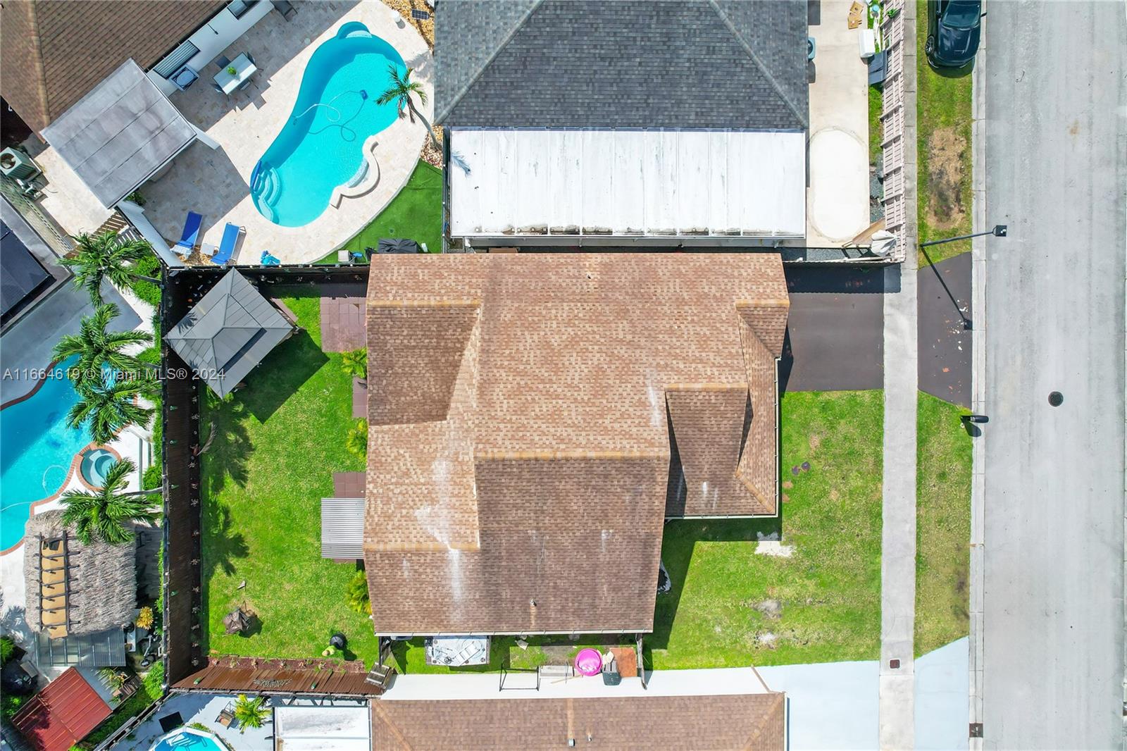 15831 Southwest 143rd Court Miami, FL 33177 - Photo 5 of 27 an aerial view of a house with a swimming pool