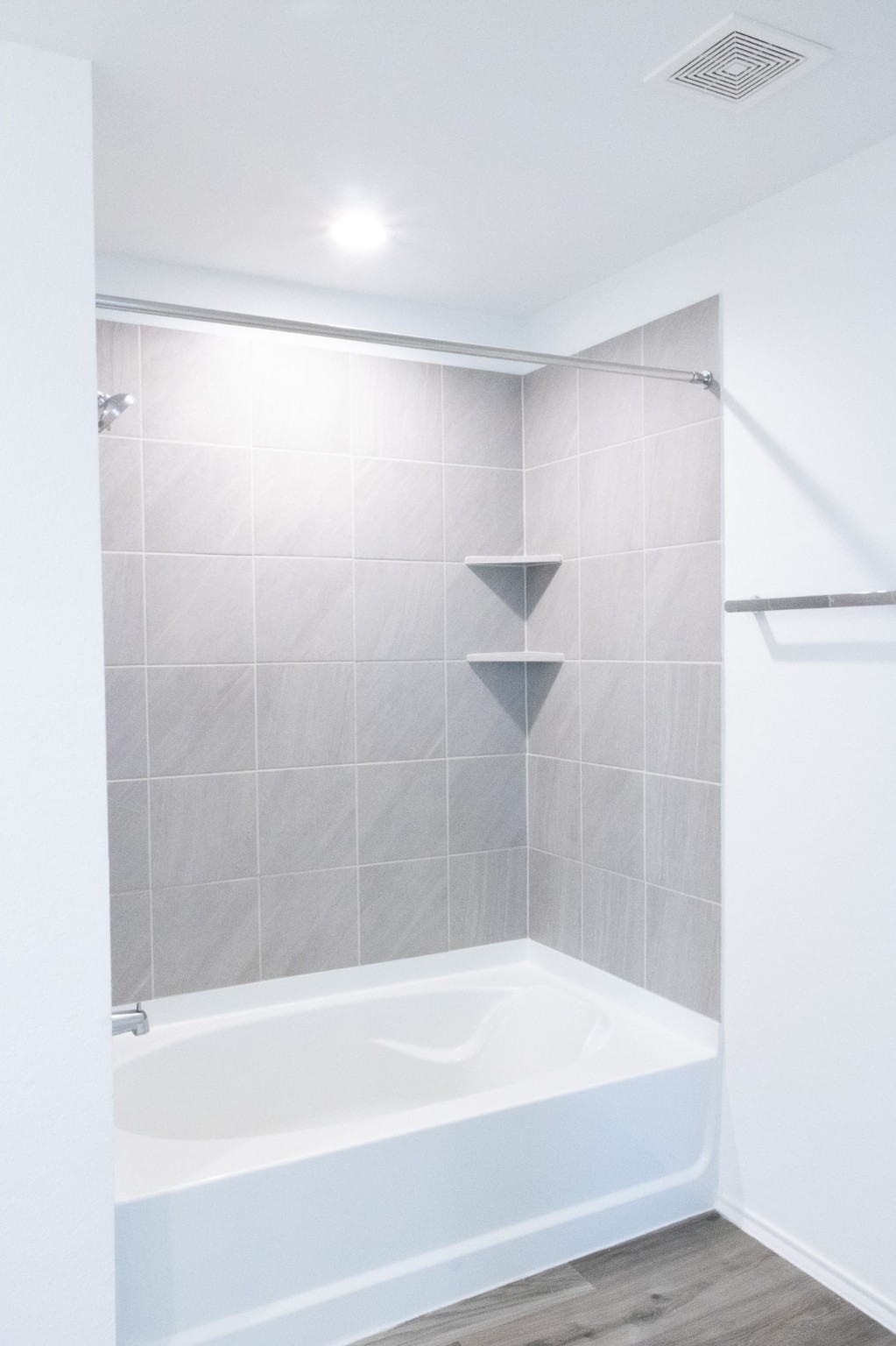 5342 Pinecliff Grove Court Spring, TX 77373 - Photo 16 of 27 a bathroom with a shower and a bathtub