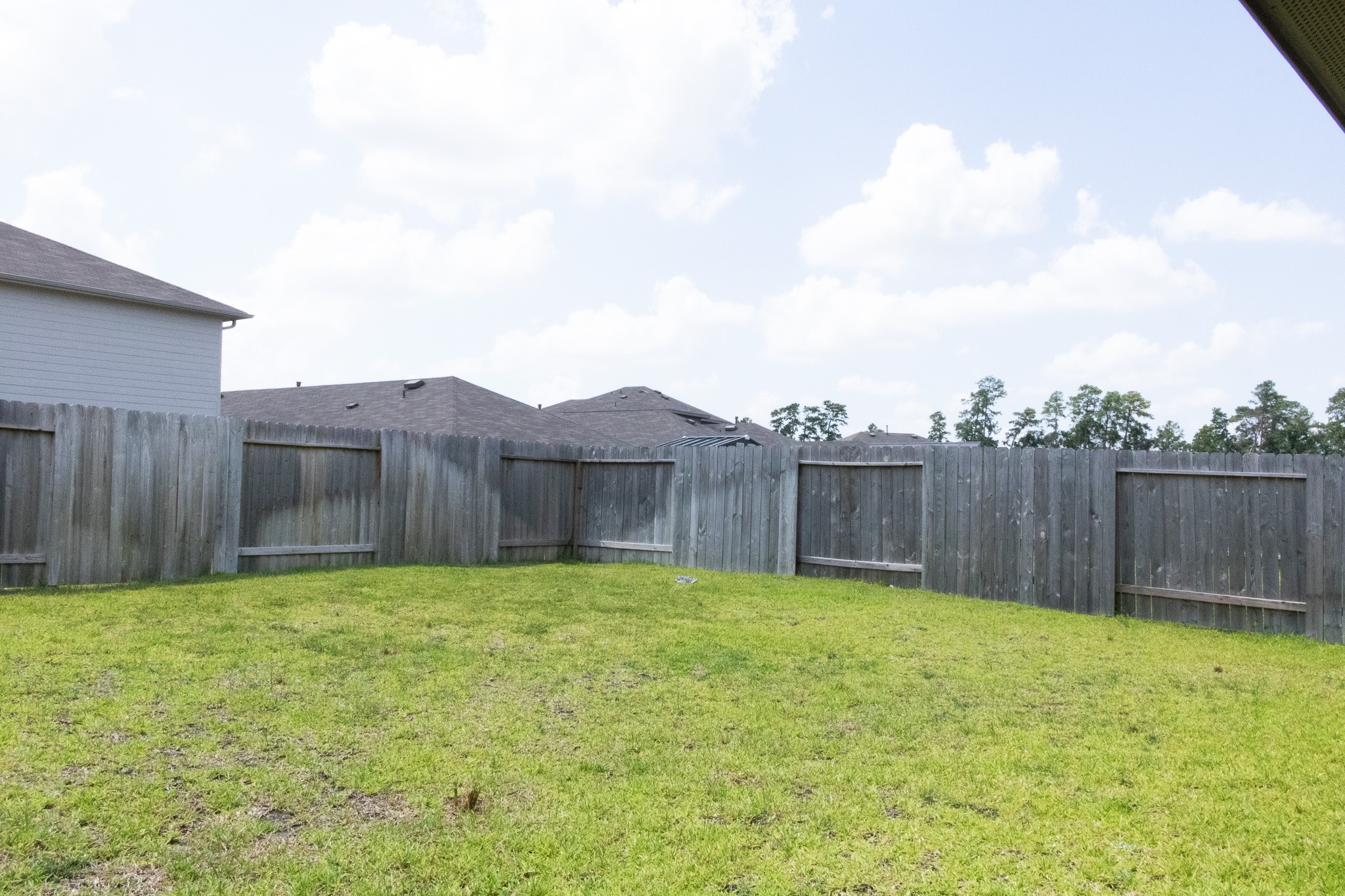 5342 Pinecliff Grove Court Spring, TX 77373 - Photo 23 of 27 a view of a backyard of a house