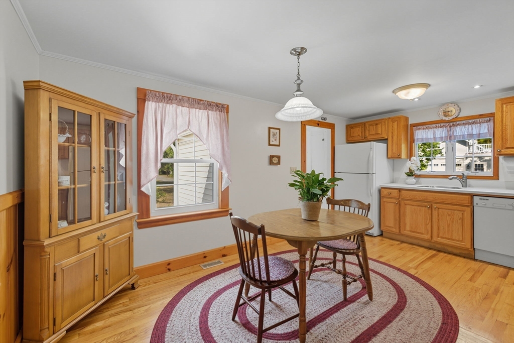 6 Defiance Lane Orleans, MA 02653 - Photo 6 of 27 a view of a dining room with furniture window and wooden floor