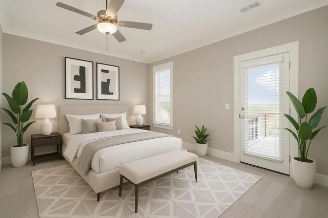 a bedroom with a large bed and a window