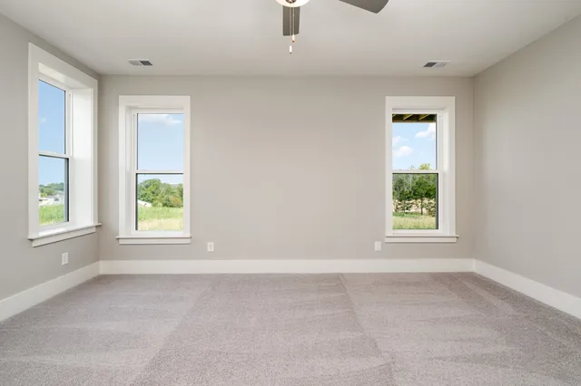 an empty room with windows